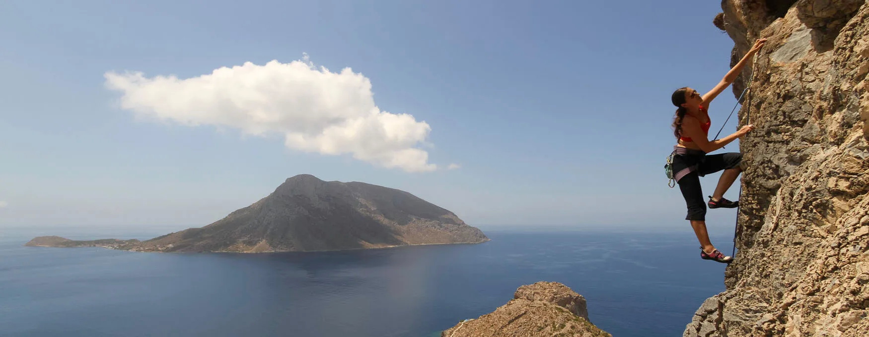 The sponge harvesting and rock climbing island The sponge harvesting and rock climbing island .